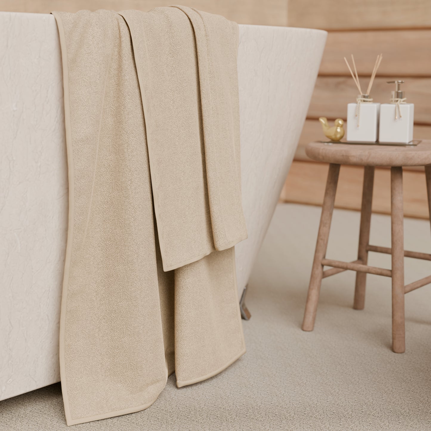 Serviettes de bain en éponge unie beige