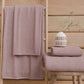 Serviettes de bain en éponge unie oignon