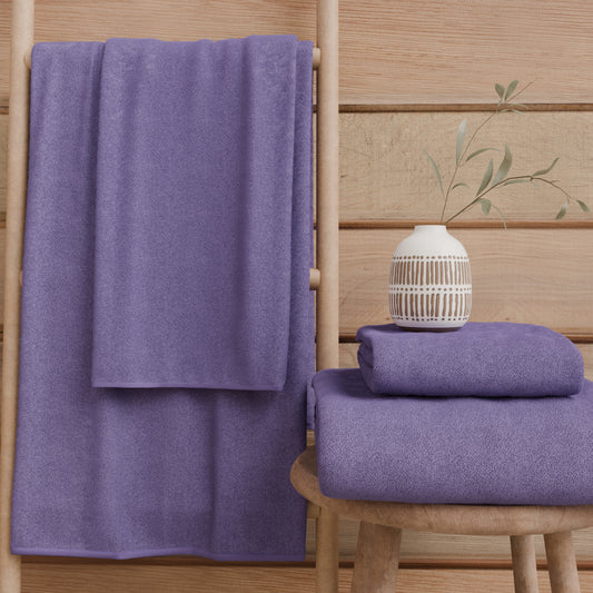 Serviettes de bain en éponge unie couleur violet