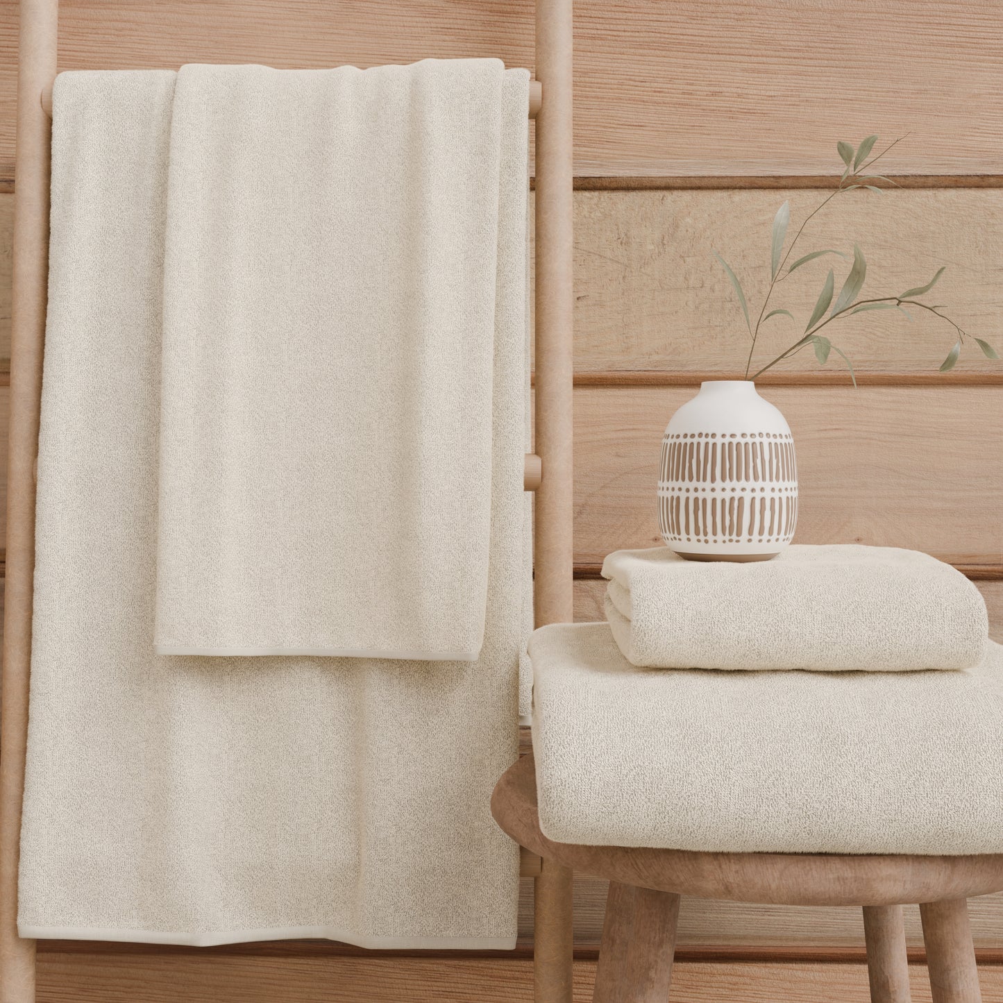 Serviettes de bain en éponge unie couleur crème