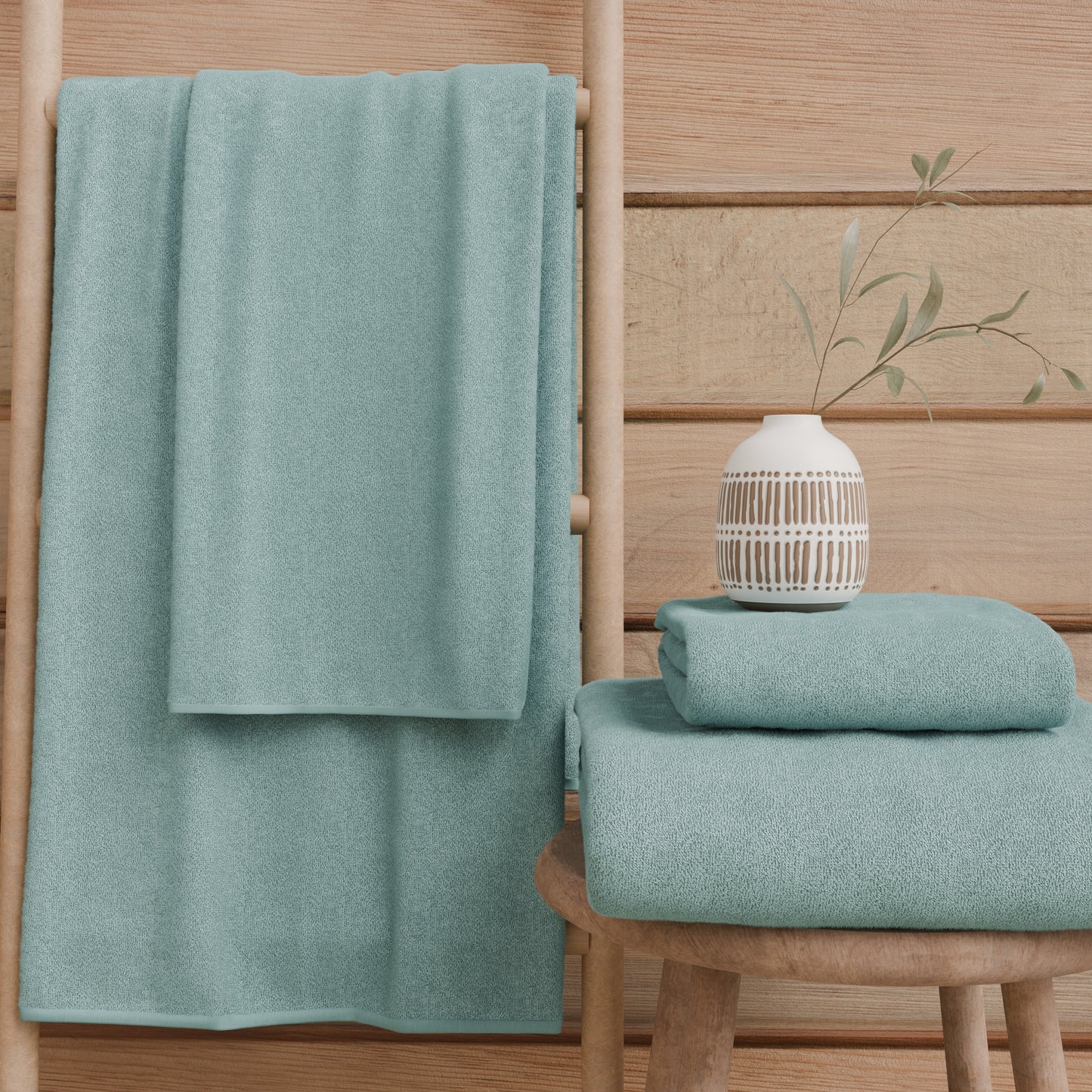 Serviettes de bain en éponge unie couleur bleu sucré