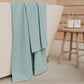 Serviettes de bain en éponge unie couleur bleu sucré